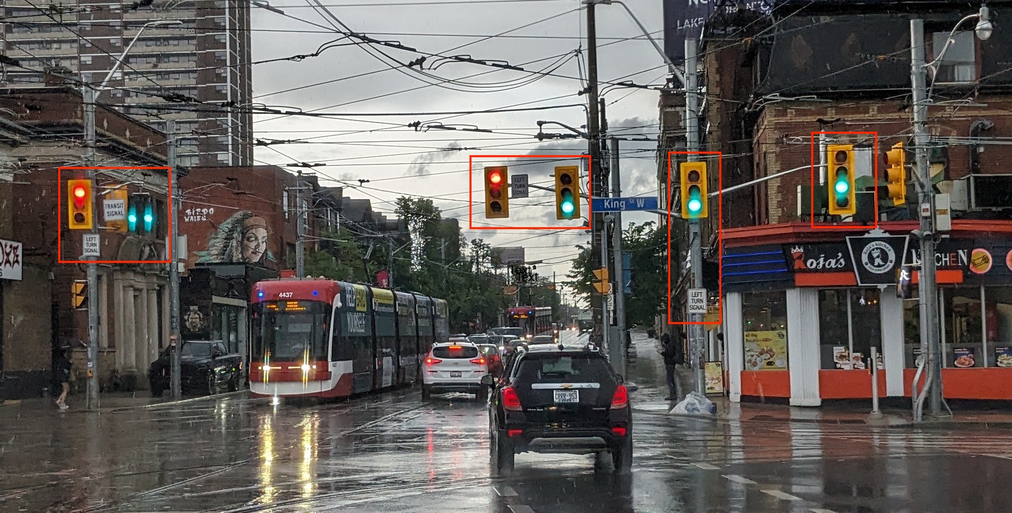 Traffic lights at King, Queen, Queensway, and Roncesvalles